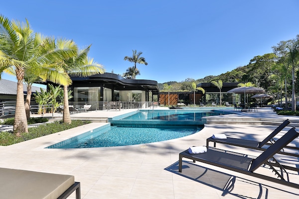 3 outdoor pools, open 6 AM to 10 PM, pool umbrellas, sun loungers