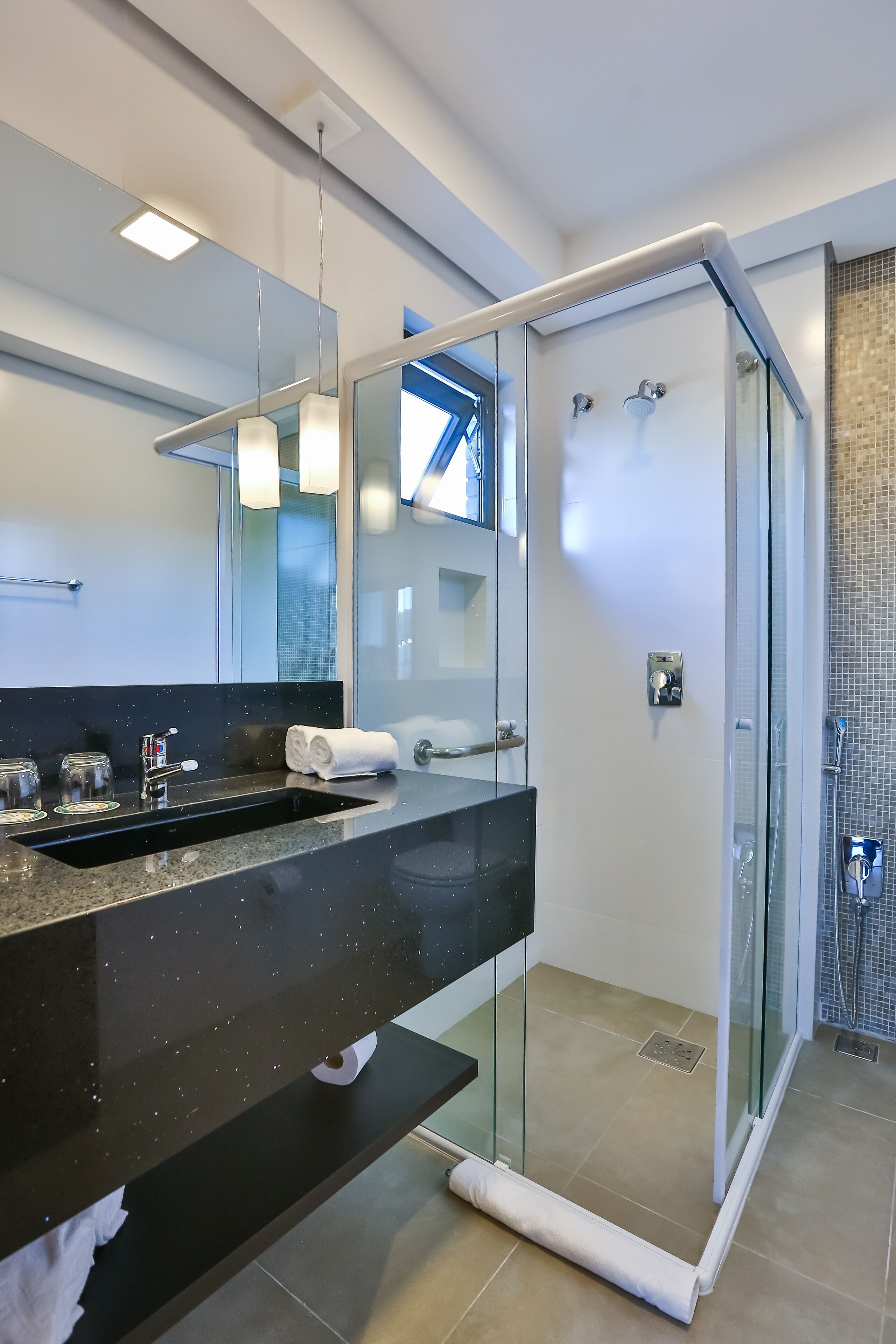 shower, free toiletries, hair dryer, towels