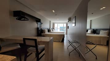 Superior Triple Room | Living area | LED TV