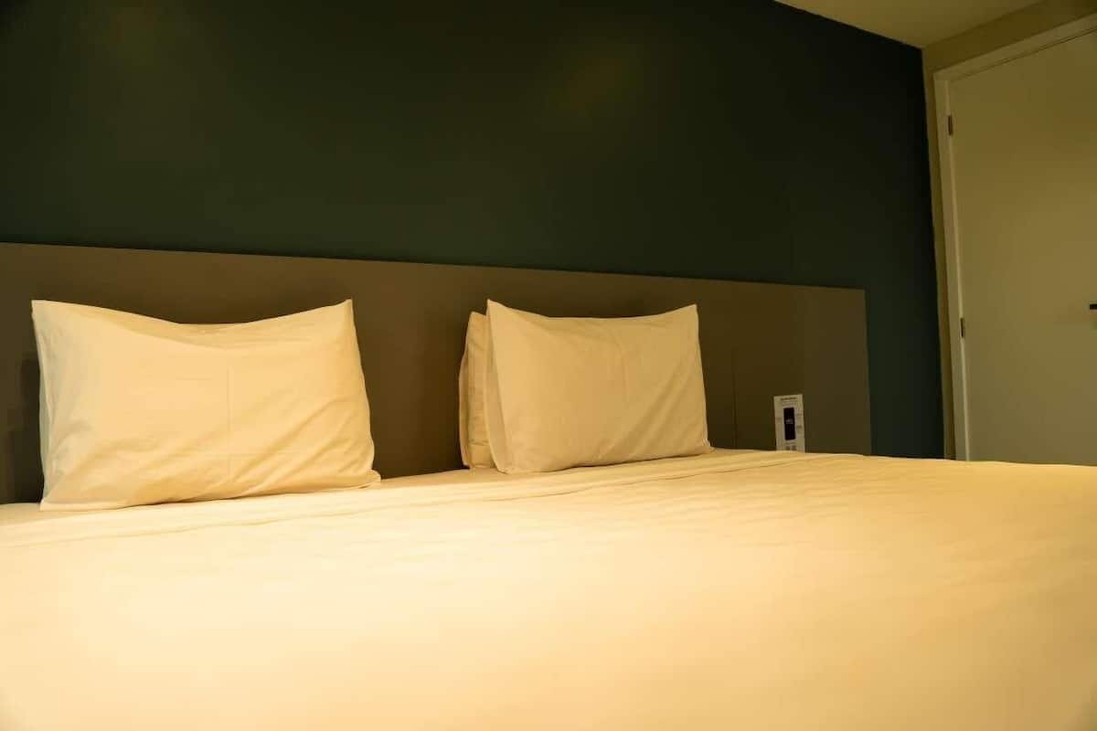 Deluxe Room, 1 King Bed with Sofa bed | Minibar, in-room safe, laptop workspace, blackout drapes