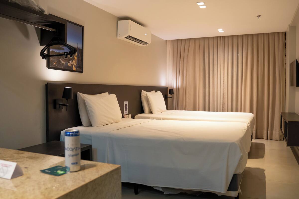 Superior Quadruple Room, 2 Double Beds | Minibar, in-room safe, laptop workspace, blackout drapes