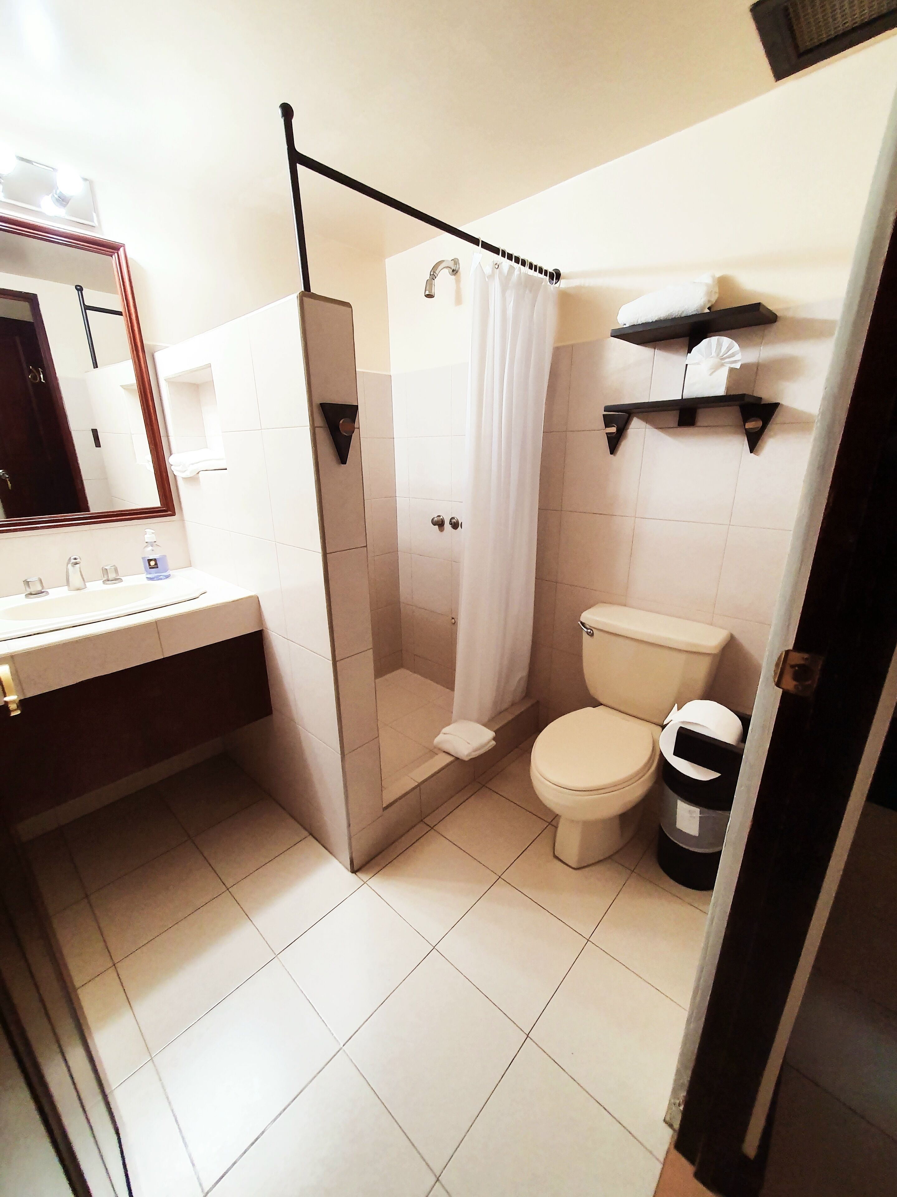 standard single room | bathroom | shower, free toiletries, hair dryer, towels