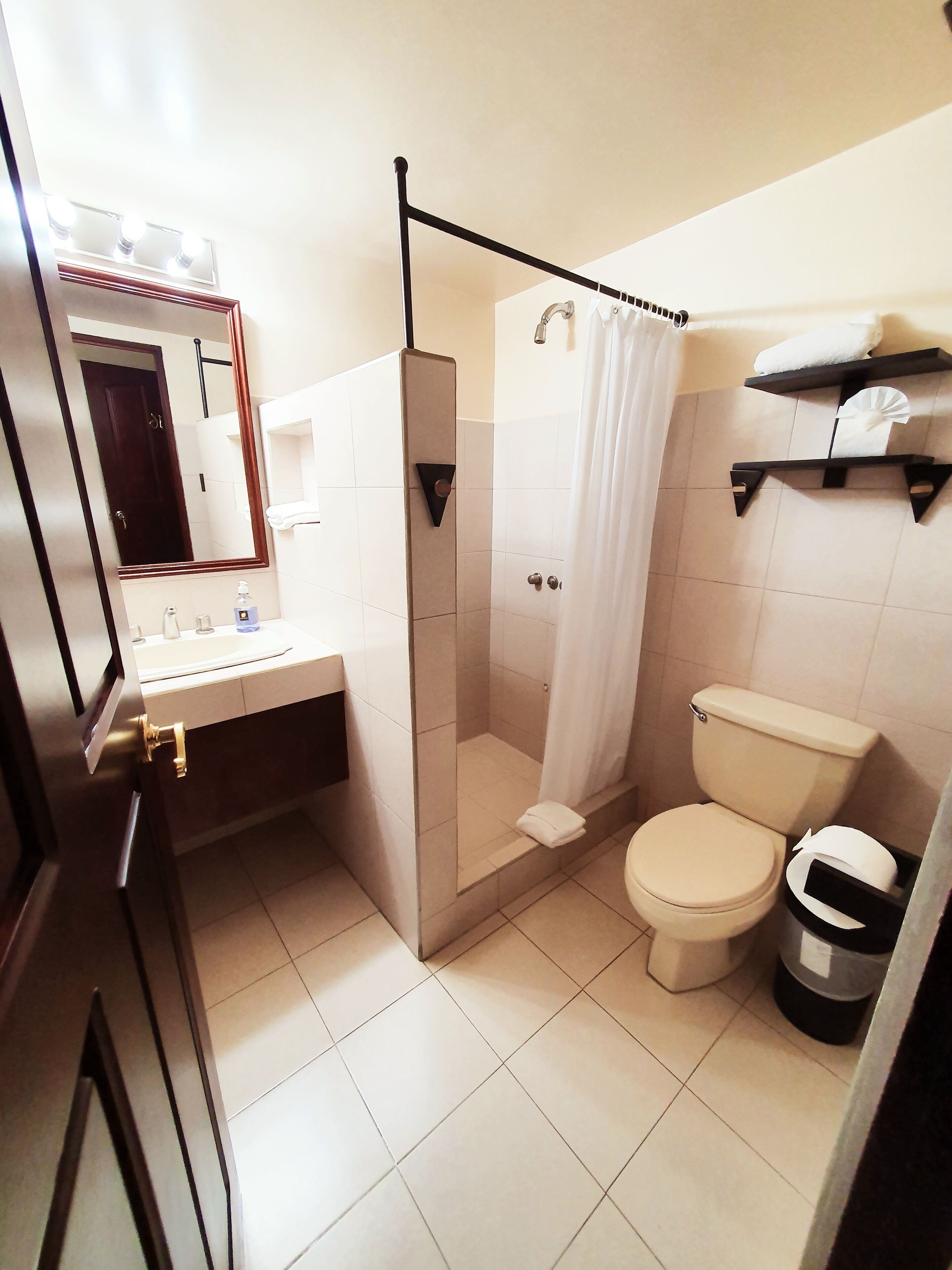 standard single room | bathroom | shower, free toiletries, hair dryer, towels