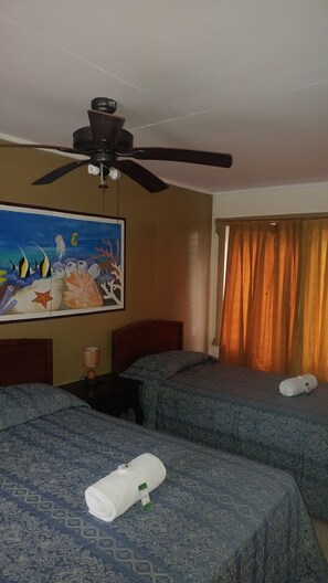Comfort Double Room, 2 Double Beds, Non Smoking | In-room safe, individually decorated, individually furnished, desk - Hotel Nataro Inn (Roatan)