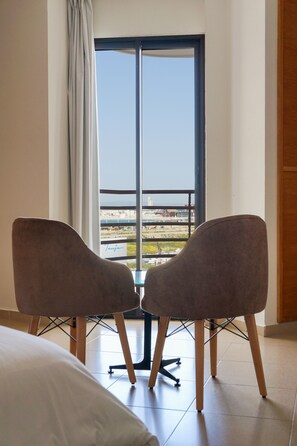 Standard Triple Room, Sea View | Desk, blackout drapes, free WiFi, bed sheets - Hotel El  Djenina (Tangier)