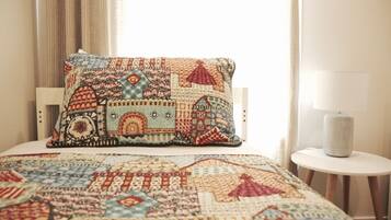 City Townhome, Multiple Beds | 3 bedrooms, premium bedding, individually decorated