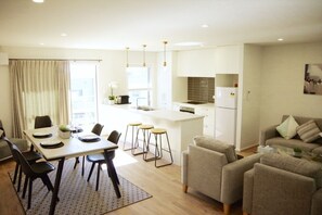 City Townhome, Multiple Beds | Living area | Flat-screen TV - Central Lake Hamilton (Hamilton)