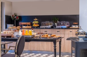 Daily buffet breakfast (EUR 33 per person)