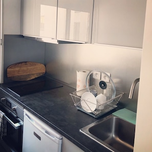 Microwave, coffee/tea maker, cookware/dishes/utensils