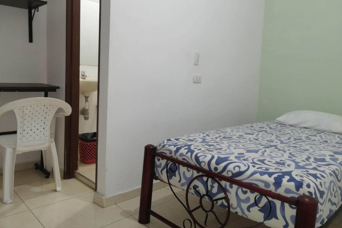 Desk, laptop workspace, free WiFi, bed sheets