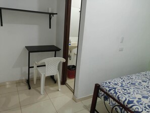 Desk, laptop workspace, free WiFi, bed sheets