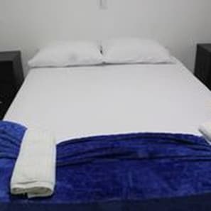 Blackout curtains, iron/ironing board, free WiFi, bed sheets