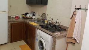 Comfort Apartment, Non Smoking | Private kitchen | Full-size fridge, microwave (on request), stovetop - Appart bel bachir (Tangier)