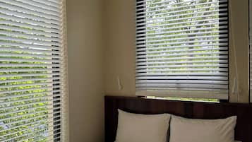 Economy Room | Premium bedding, pillowtop beds, desk, laptop workspace