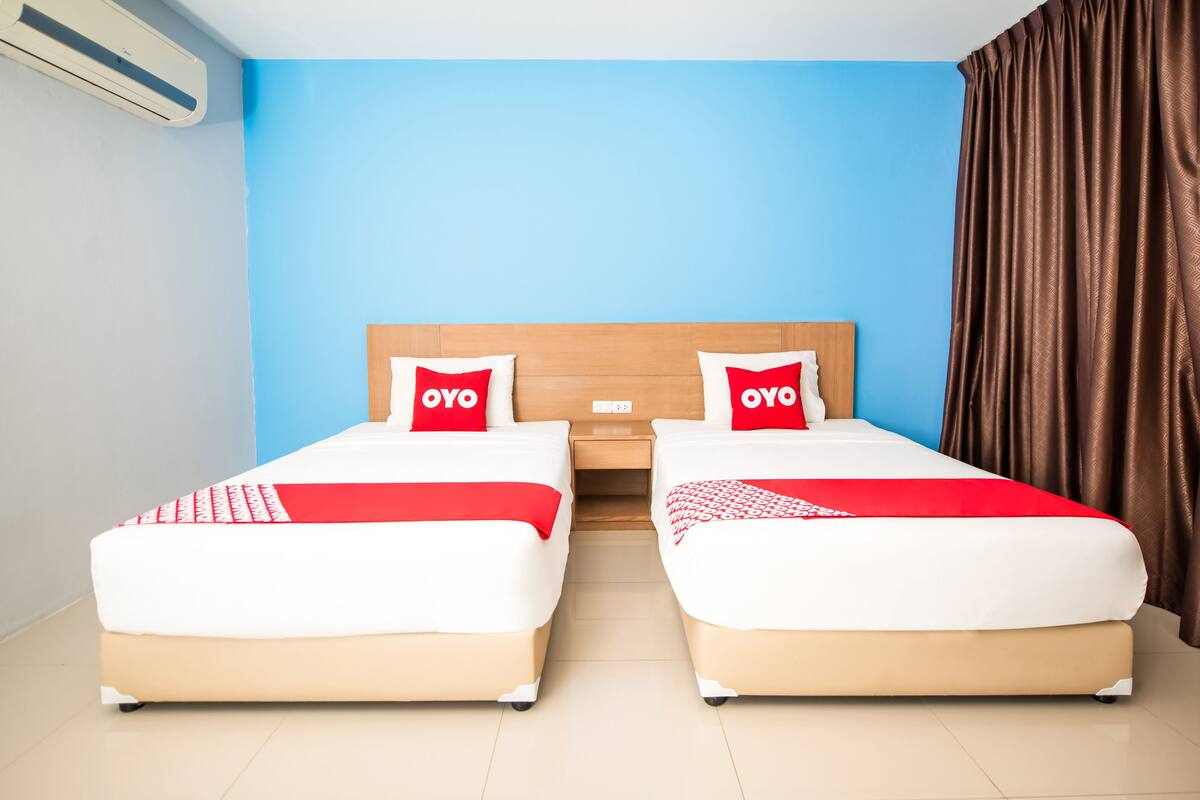 Standaard Twin kamer | Een bureau, geluiddichte muren, gratis wifi, beddengoed