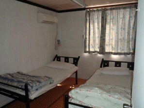 Twin Room, Shared Shower Surcharge