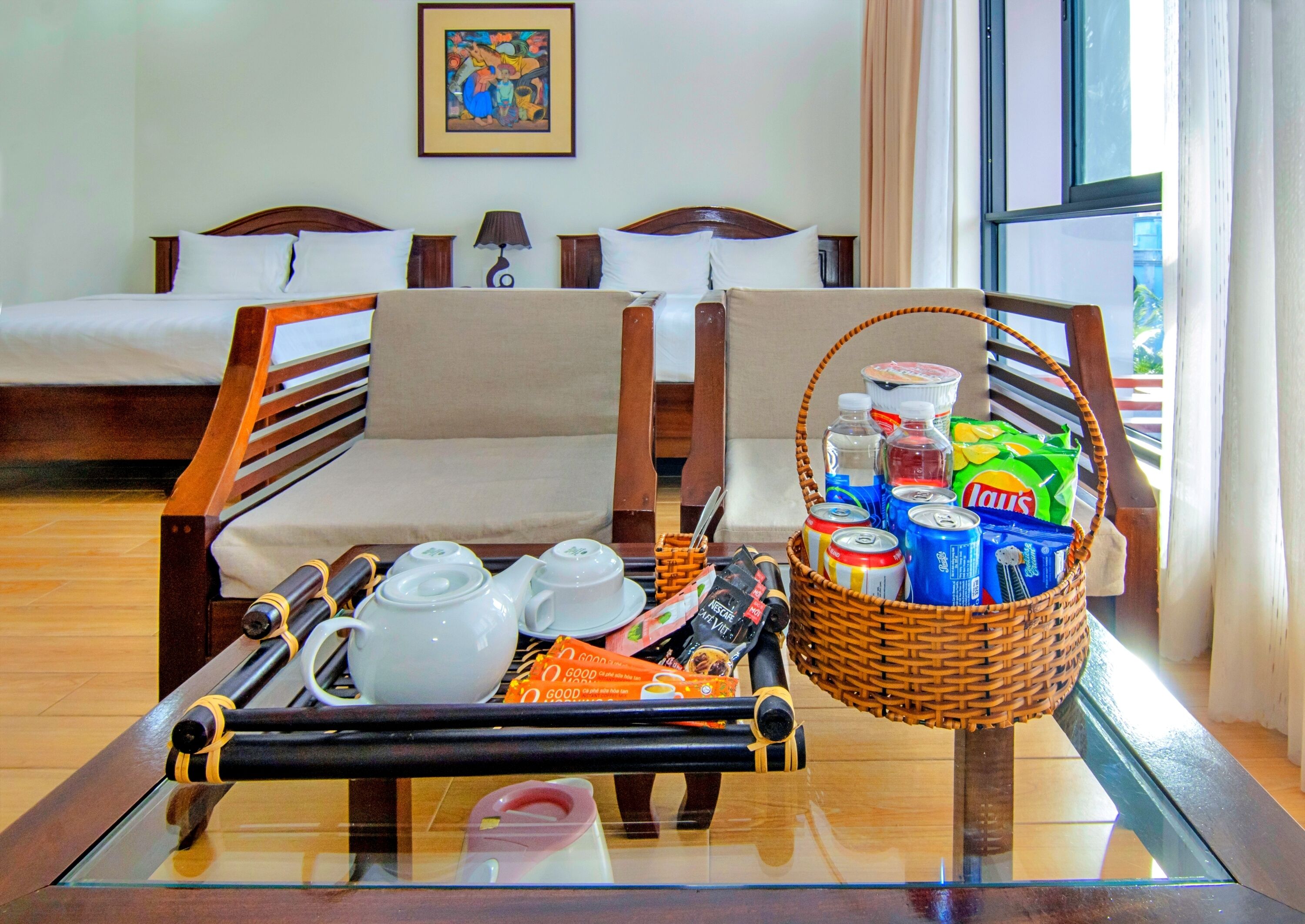 deluxe family room | premium bedding, desk, laptop workspace, blackout curtains