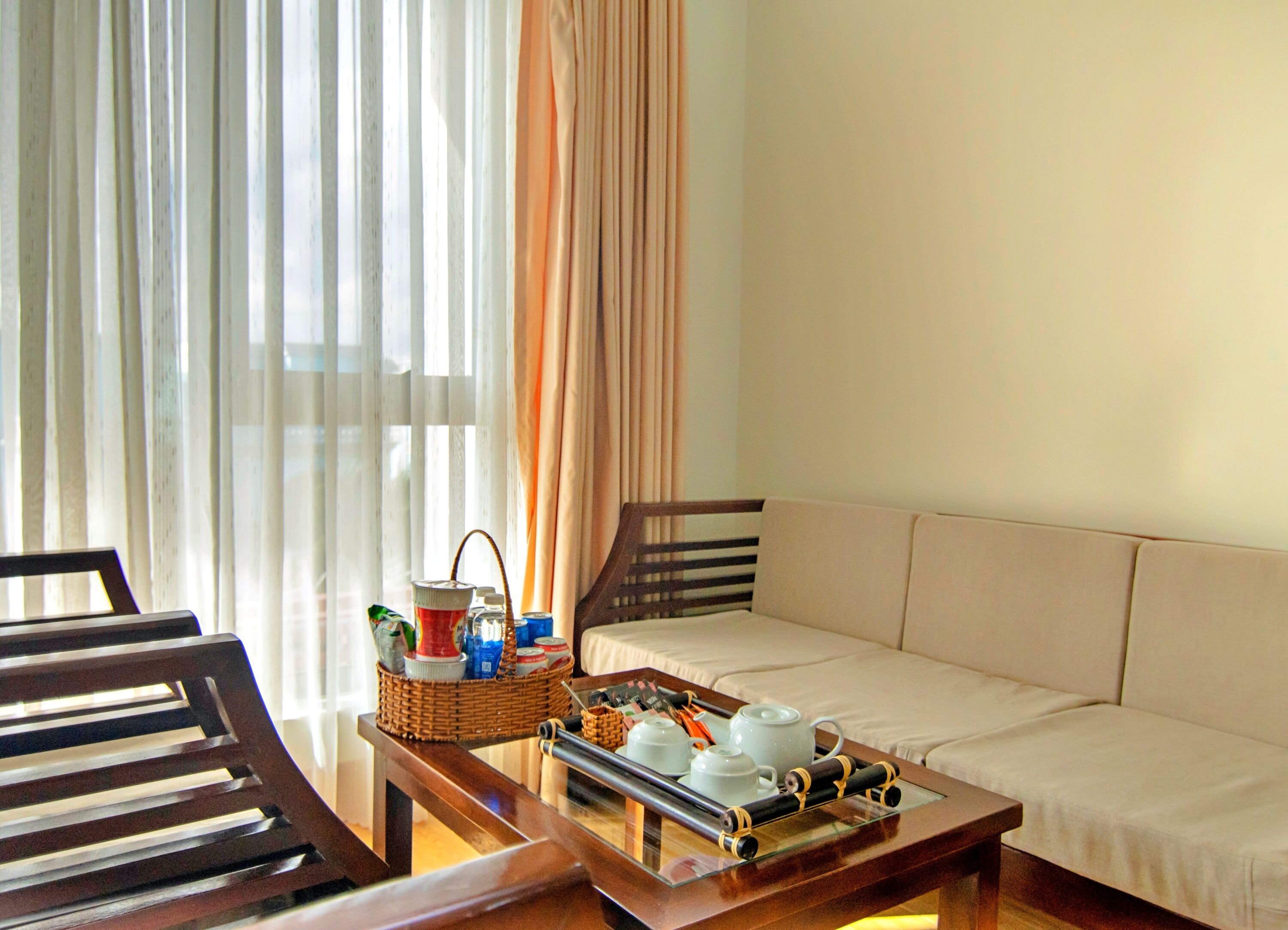 deluxe family room | premium bedding, desk, laptop workspace, blackout curtains