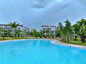 2 outdoor pools, pool umbrellas, pool loungers