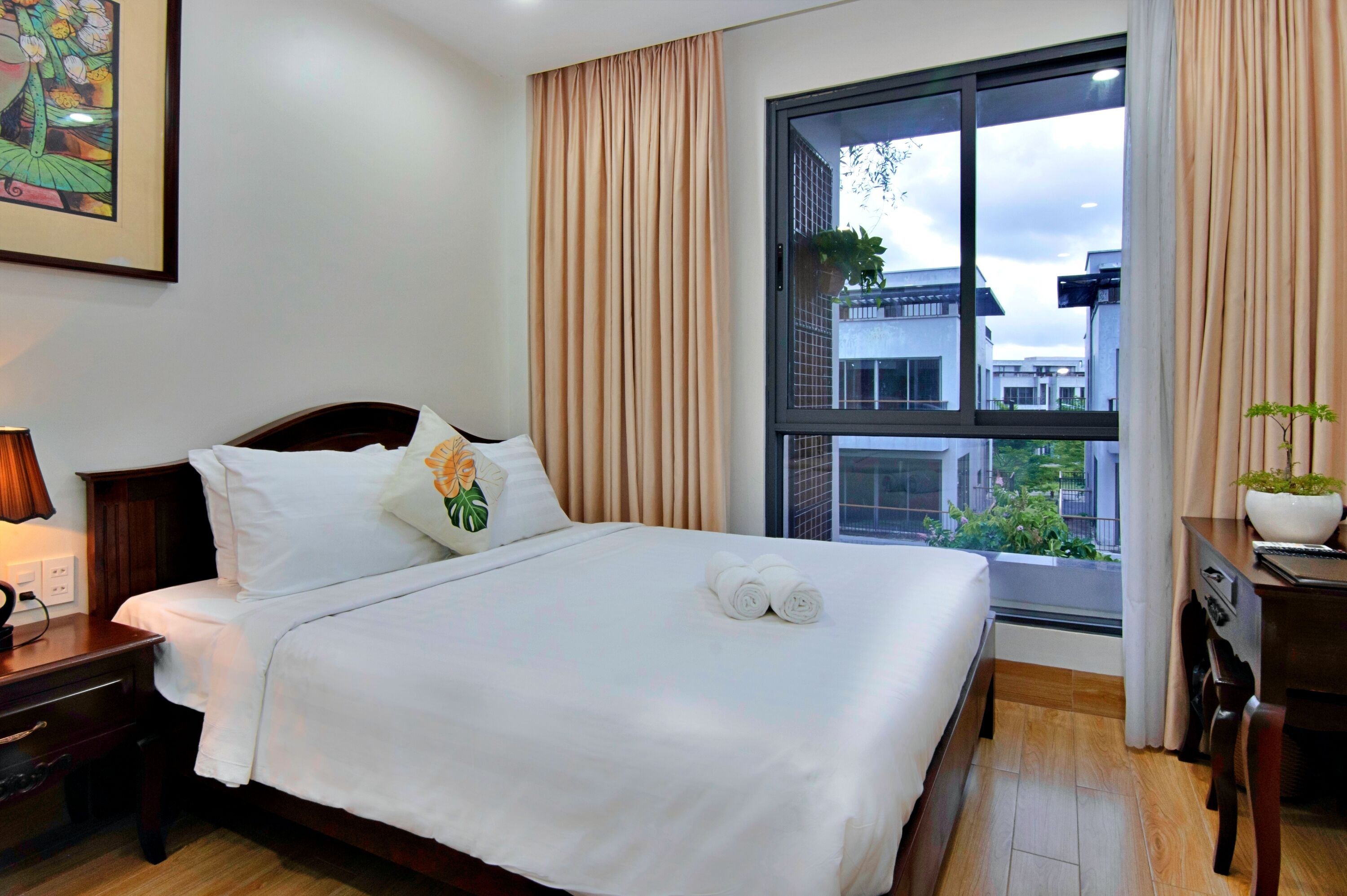 superior room | premium bedding, desk, laptop workspace, blackout curtains
