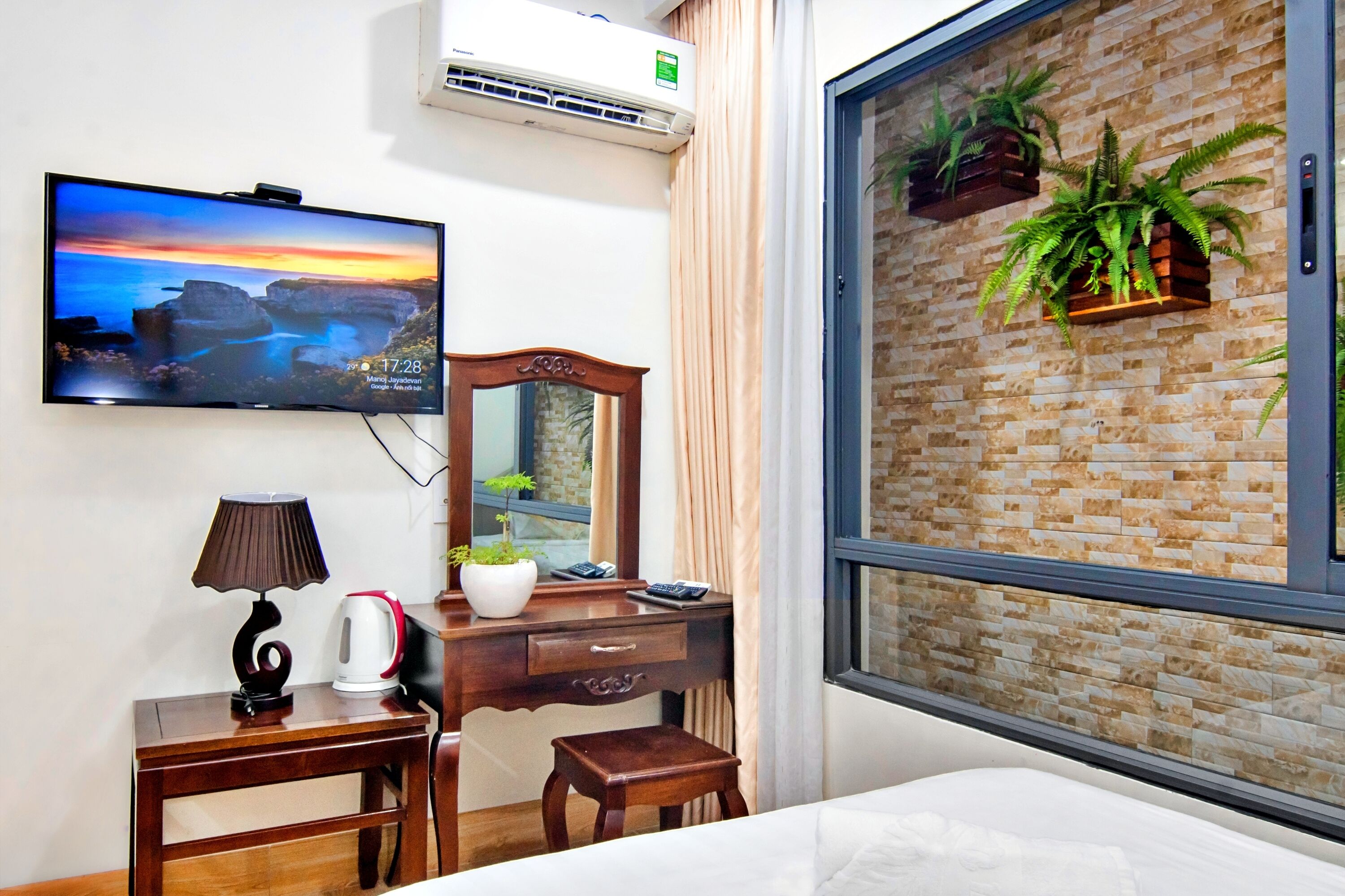 deluxe triple room | premium bedding, desk, laptop workspace, blackout curtains