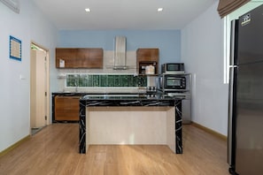 Four Bedrooms Pool Villa | Private kitchen | Full-sized fridge, microwave, electric kettle