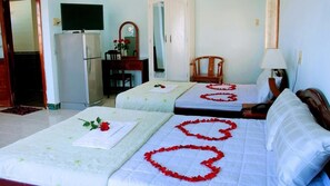 Deluxe Quadruple Room | Desk, blackout drapes, free WiFi, bed sheets - Queen Hotel 3 (Nha Trang)