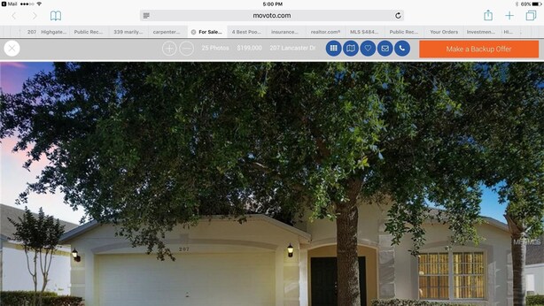 A single-story house with a garage, a tree in front, and a mailbox. - Perfect Vacation Getaway-Modern Gated Community, Spacious, Pool, Game Room, WiFi (Davenport)