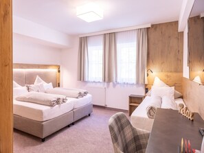 Literie de qualité supérieure, minibar, décoration personnalisée