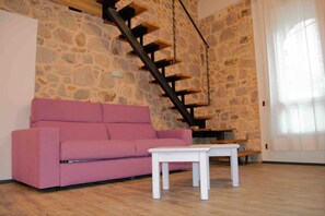 Departamento, 1 habitación | Área de sala de estar | Televisión LCD