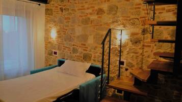 Triple Room | Premium bedding, in-room safe, desk, blackout drapes