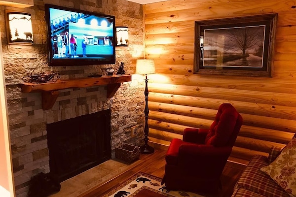 Newly renovated living room with large flat screen TV