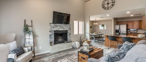 Living area | Smart TV, fireplace, books