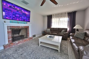 Smart TV, fireplace, books