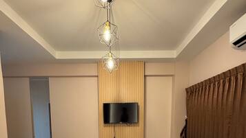 Blackout curtains, soundproofing, iron/ironing board, rollaway beds