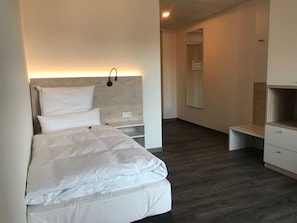 Ropa de cama de alta calidad y minibar 