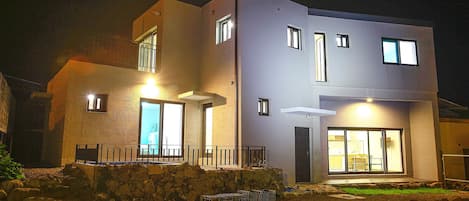 Front of property - evening/night