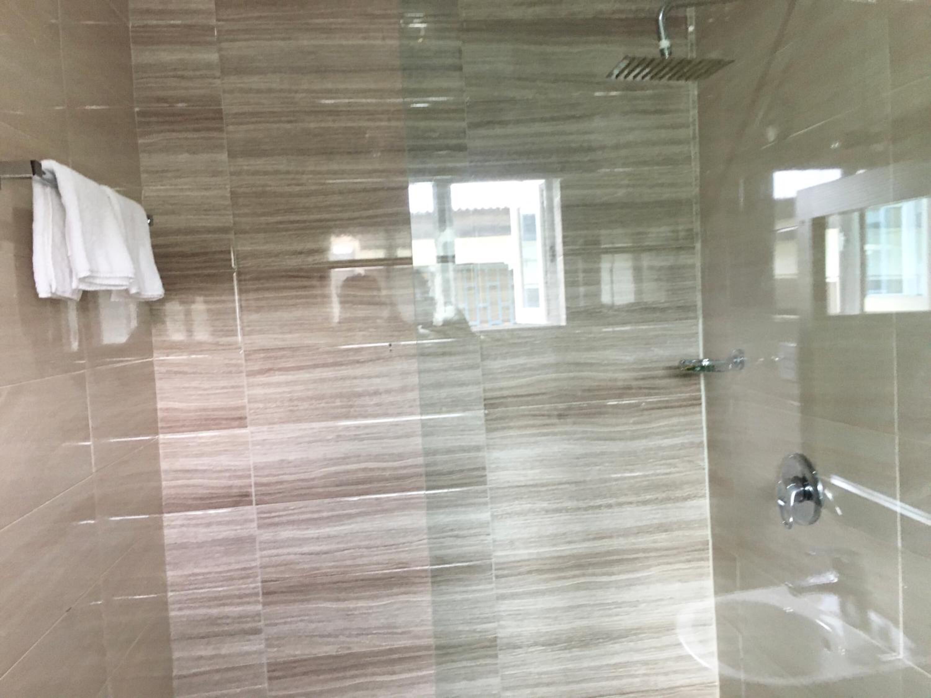 Designer toiletries, hair dryer, bathrobes, slippers