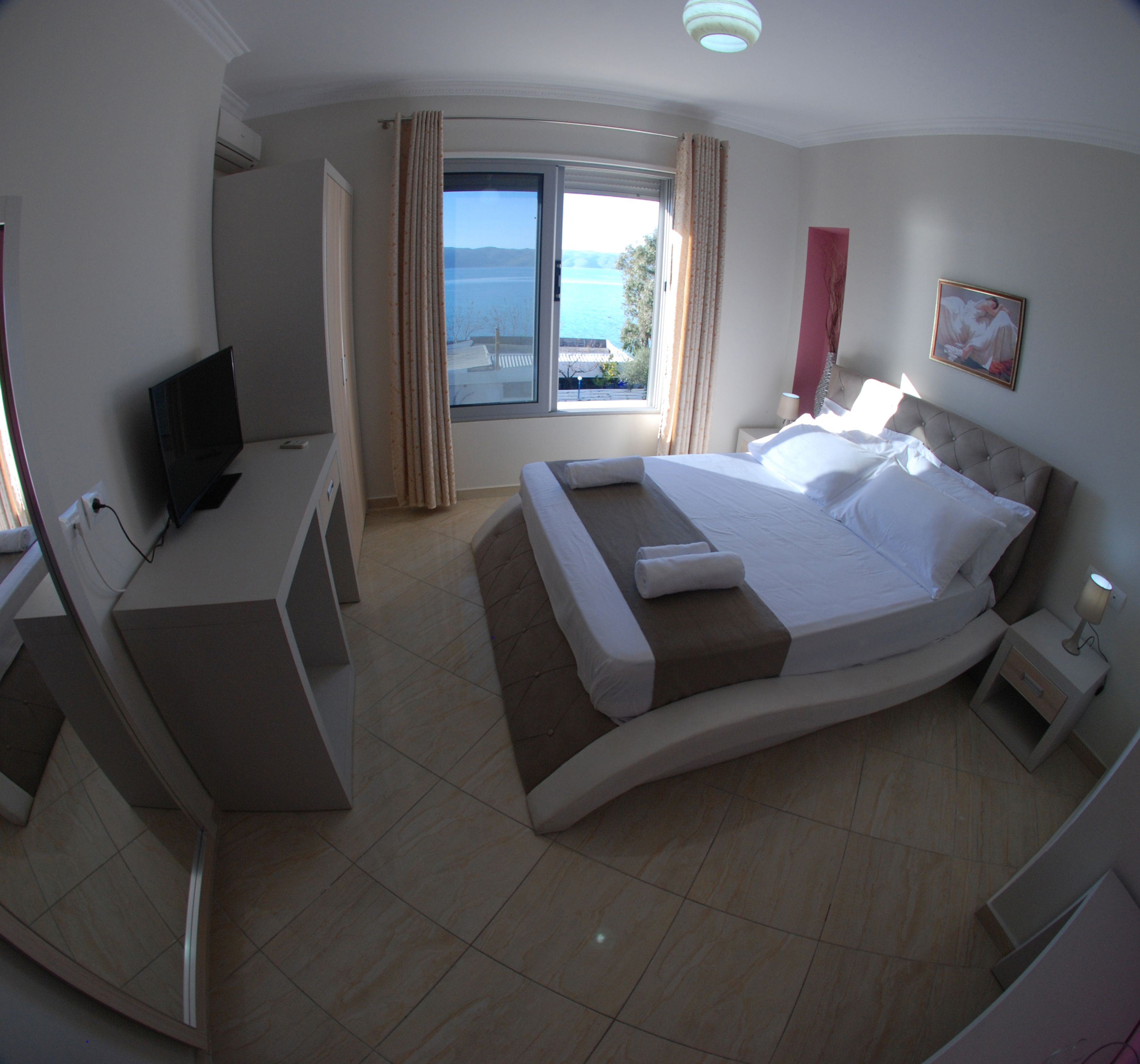 quadruple room with sea view  | in-room safe, desk, blackout curtains, soundproofing