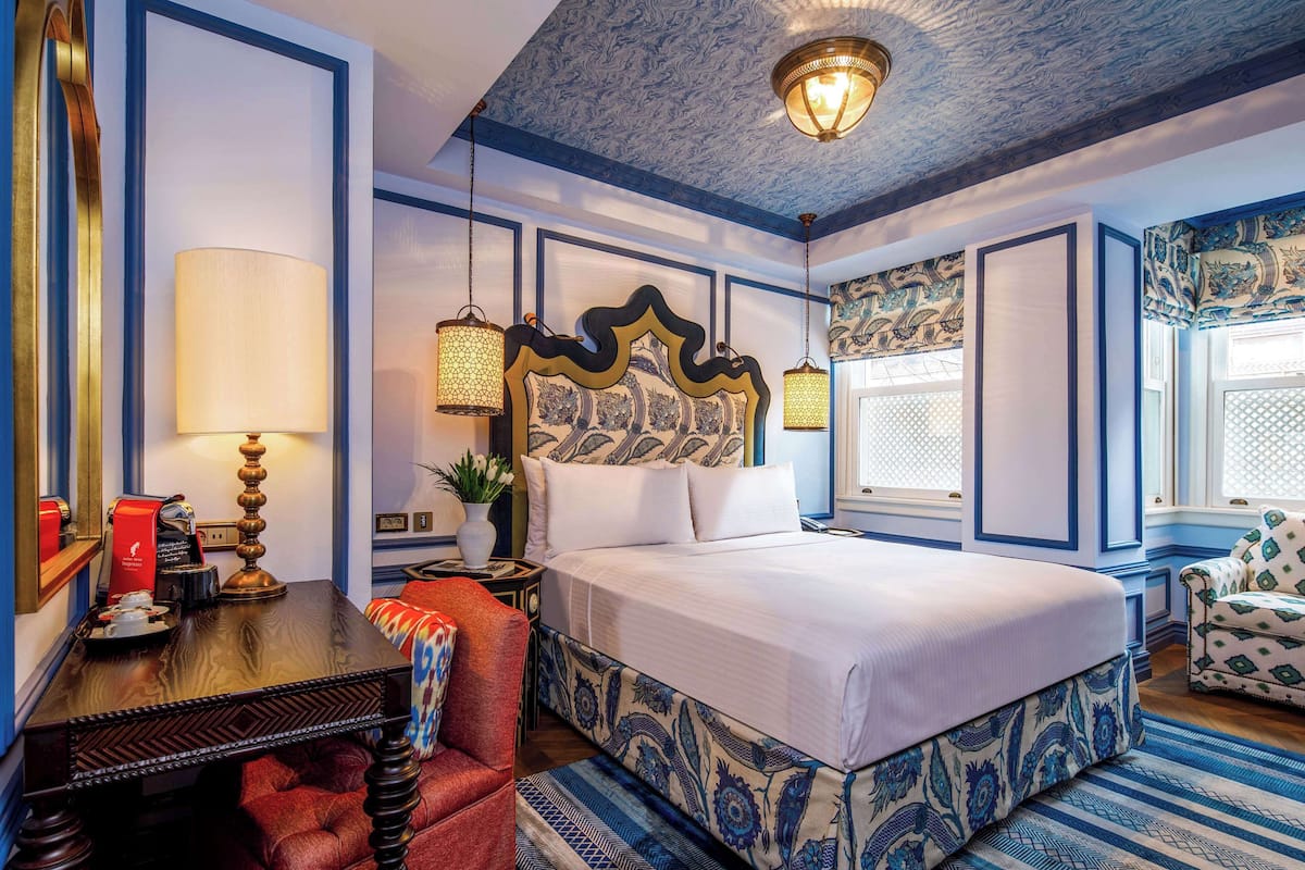Premium bedding, down comforters, minibar, in-room safe