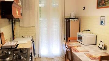 Fridge, stovetop, cookware/dishes/utensils