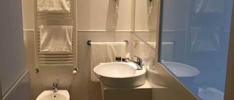 Shower, rainfall showerhead, hair dryer, towels