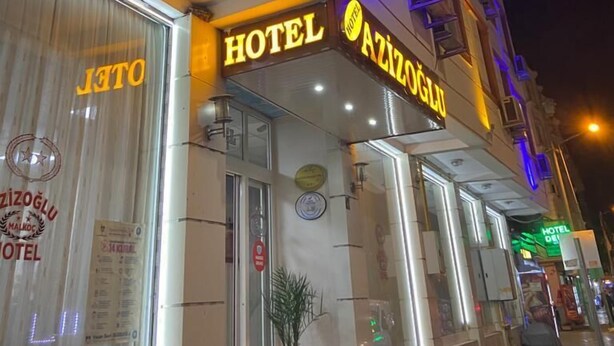 A hotel with a sign that reads "HOTEL AZIZOGLU" and a visible entrance. - Azizoglu Malkoc Hotel (Diyarbakir)