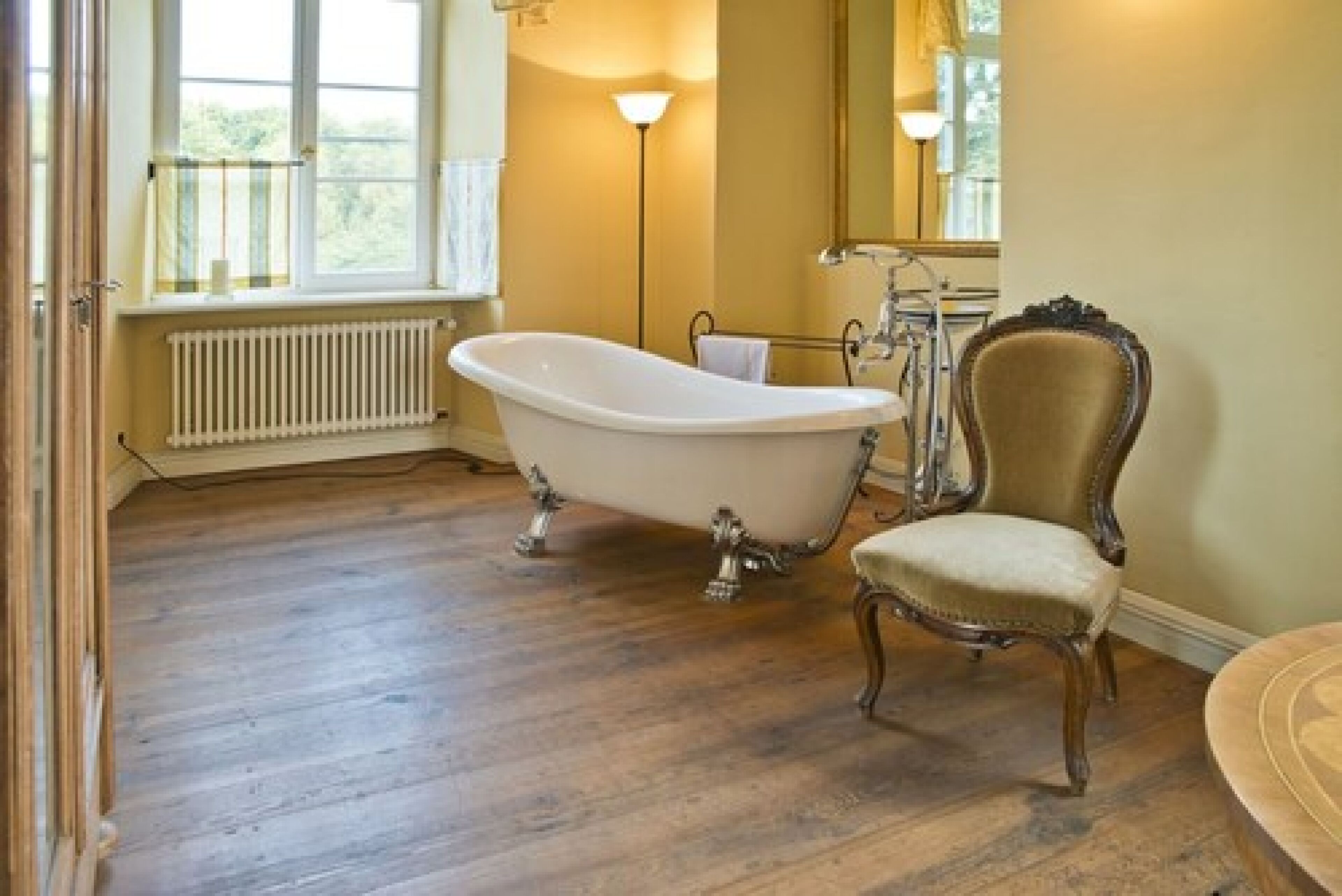 junior suite | bathroom | shower, hair dryer, towels, soap