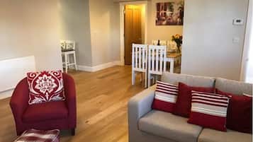 Apartment, 1 Bedroom | Living area | Flat-screen TV