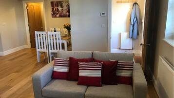 Apartment, 1 Bedroom | Living area | Flat-screen TV