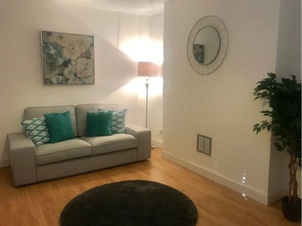 Apartment, 1 Bedroom | Living room | Flat-screen TV