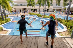 5 indoor pools, outdoor pool, open 7 AM to 11 PM, pool umbrellas