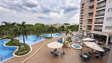 5 indoor pools, outdoor pool, open 7 AM to 11 PM, pool umbrellas
