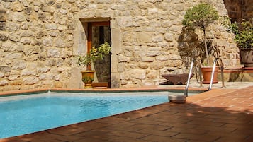 Seasonal outdoor pool, pool umbrellas, pool loungers